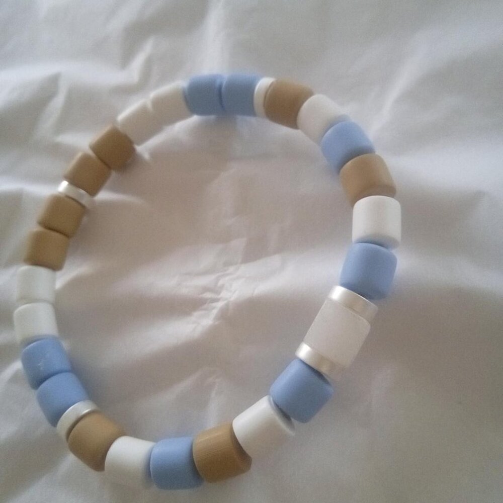 Bracelet...sretch bracelet, mini cube shape center bead...7" inches